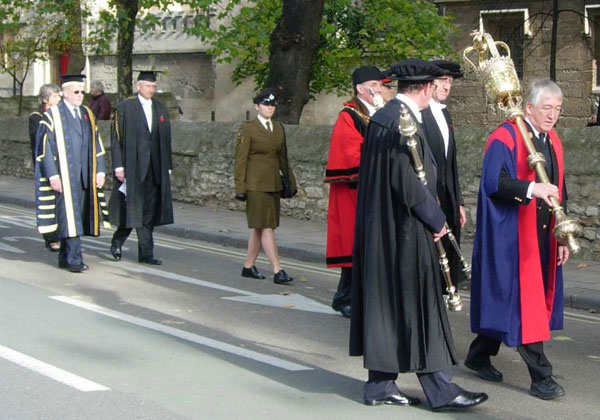 Chancellors preceded by city mace-bearer and bedels